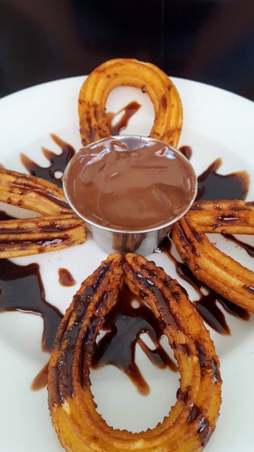 Churros Dipped in Chocolate